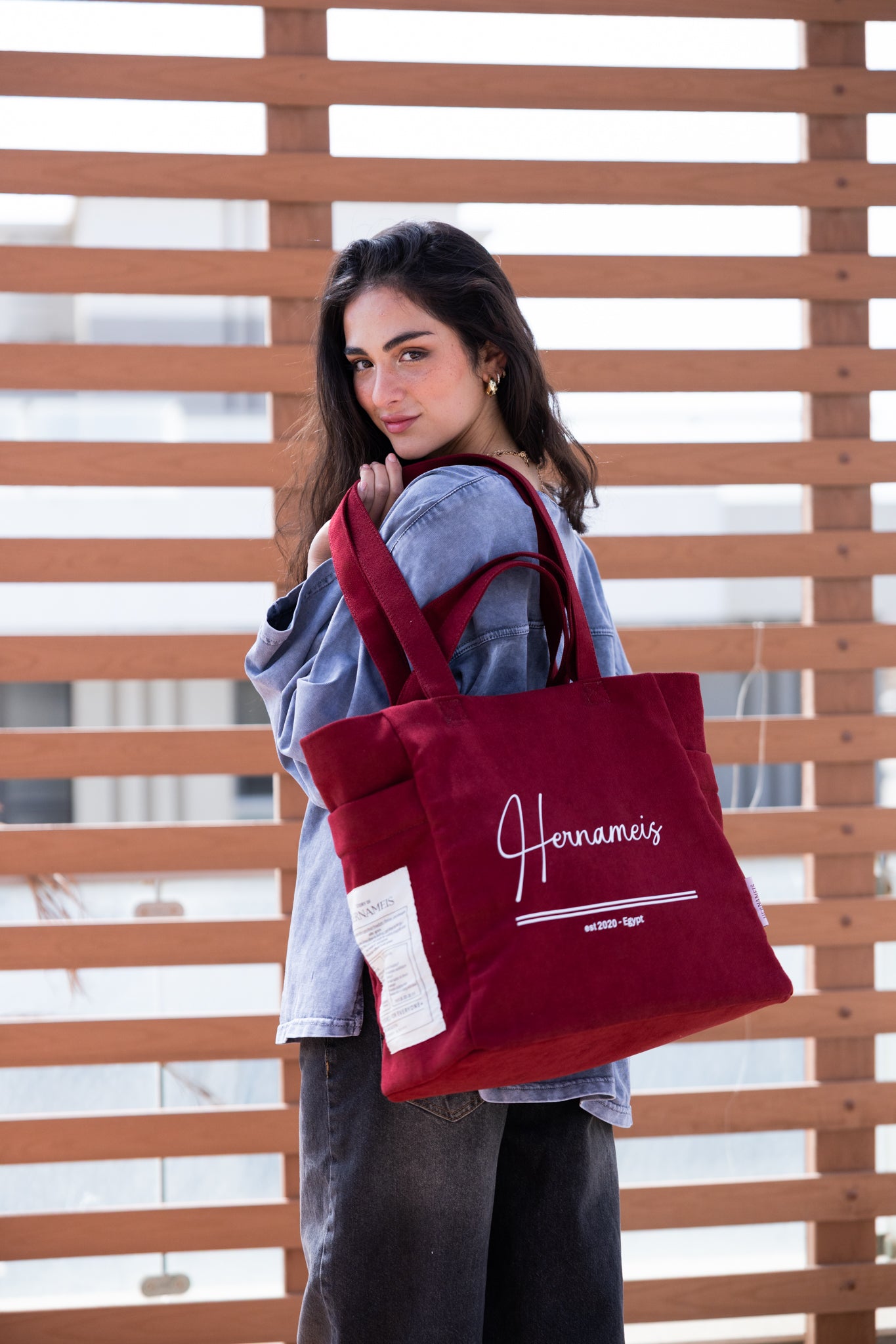 HER NAME IS TOTE BAG IN WINE