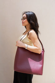 Her Leather Bag In Berry