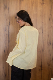 Ruffle Me Up Blouse In Butter Yellow